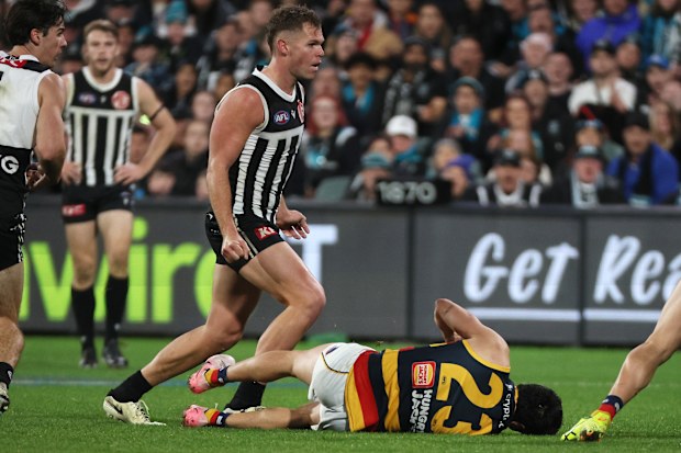 Dan Houston of the Power collides with Izak Rankine of the Crows during the 2024 AFL Round 23 matchup between Port Adelaide Power and Adelaide Crows at Adelaide Oval on August 17, 2024 in Adelaide, Australia. (Photo by James Elsby/AFL Photos via Getty Images)