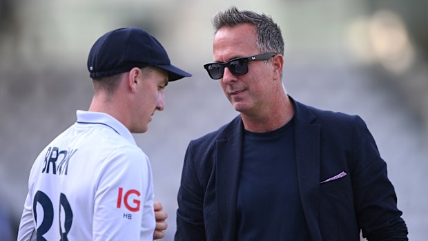 Michael Vaughan (right) talking to Harry Brook.