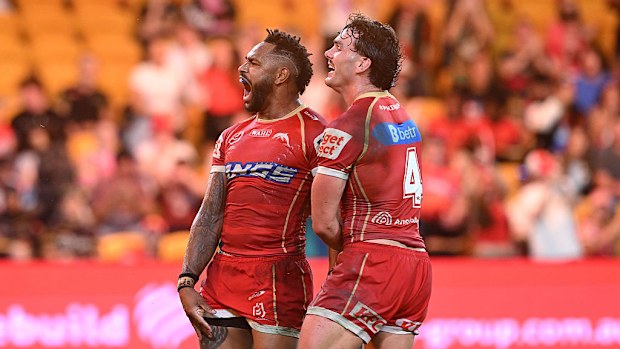 Hamiso Tabuai-Fidow of the Dolphins celebrates after scoring a try.