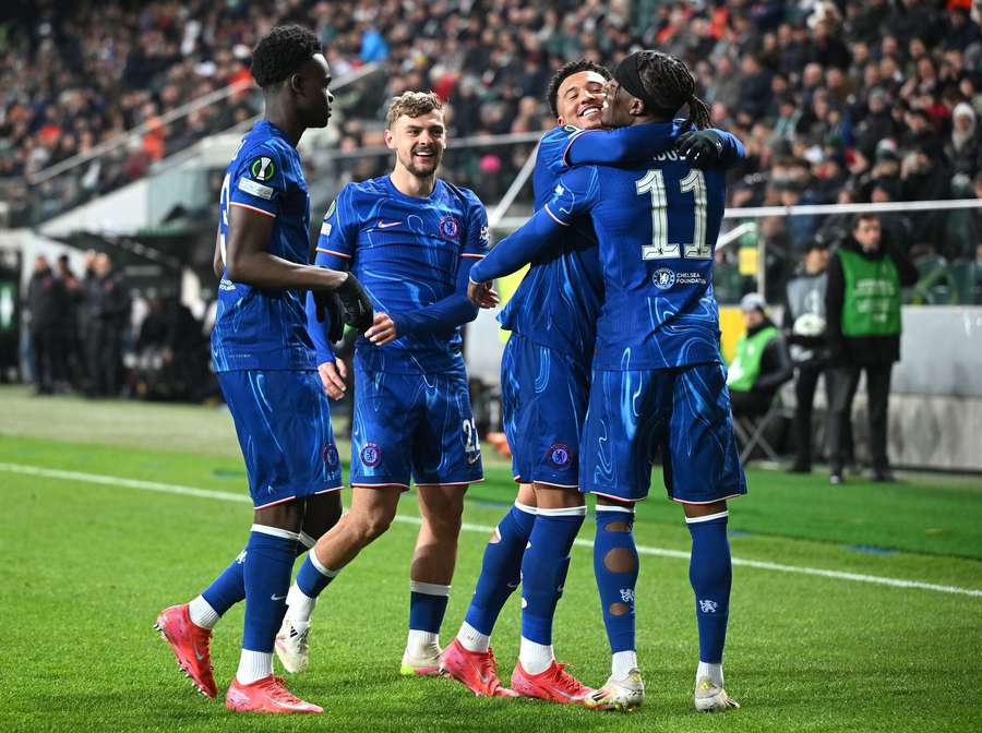 Chelsea celebrate a goal against Legia Warsaw