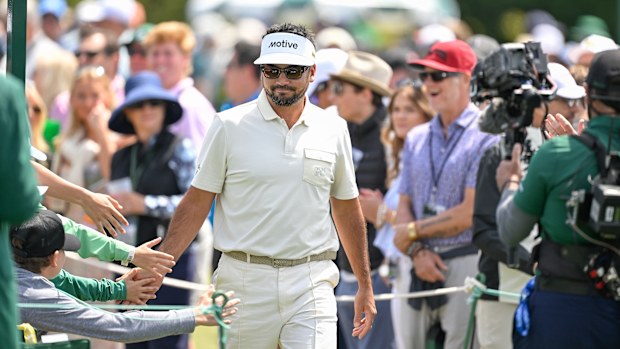 Jason Day of Australia high fives patrons while walking towards the first tee box during the third round of Masters Tournament at Augusta National Golf Club on April 12, 2025 in Augusta, Georgia. (Photo by Ben Jared/PGA TOUR via Getty Images)