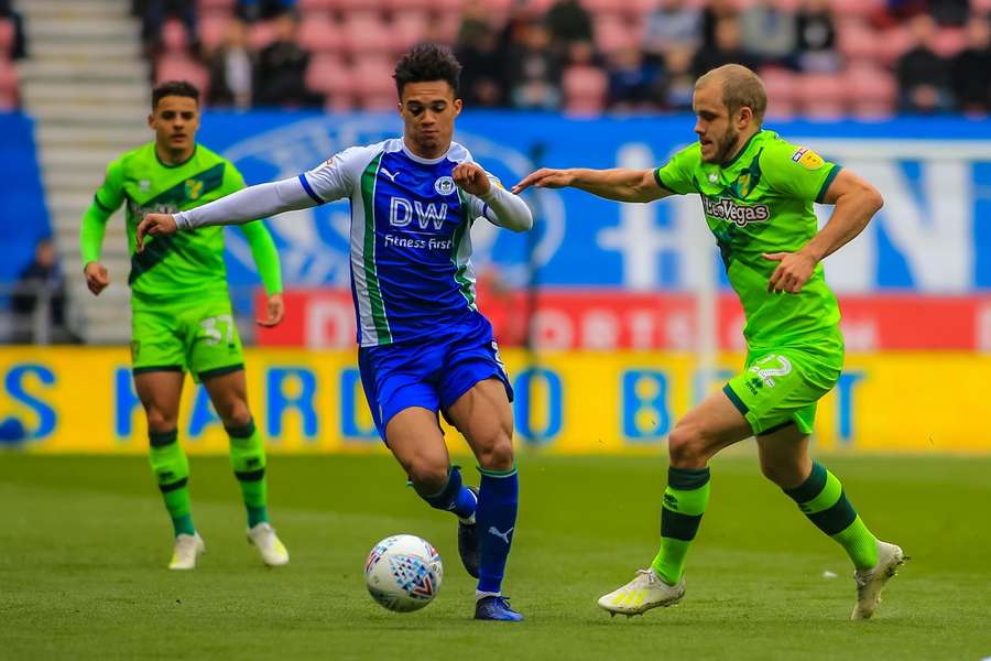 Robinson resists pressure from Norwich's Teemu Pukki in 2019