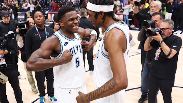 Anthony Edwards and Jaden McDaniels of the Minnesota Timberwolves celebrate.