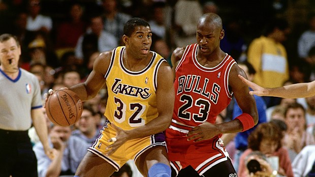 Magic Johnson posts up on Michael Jordan in 1991.