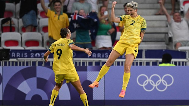 Michelle Heyman celebrates scoring a goal with teammate Caitlin Foord during a match at Paris 2024.