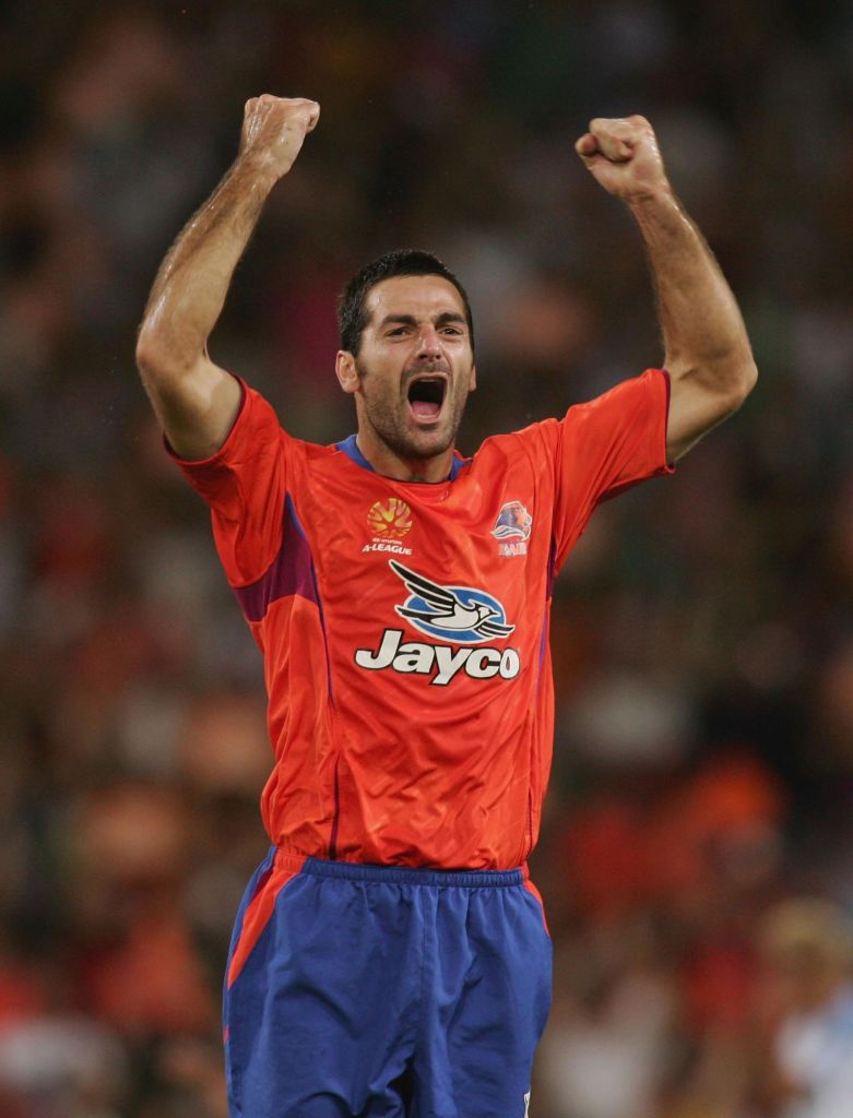 Ognenovski celebrates a goal