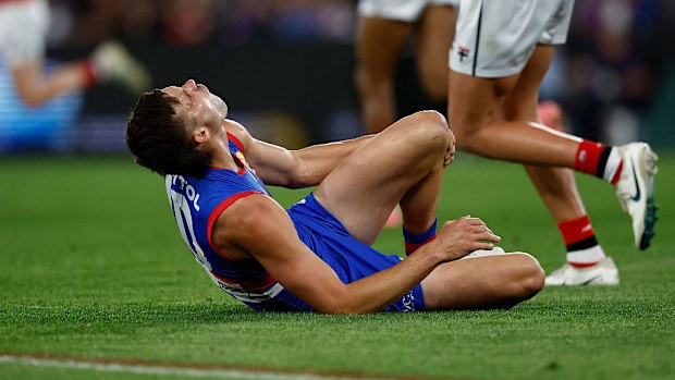 Sam Darcy of the Bulldogs is seen injured.