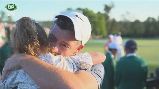 Rory McIlroy hugs daughter Poppy after winning the Masters at Augusta.