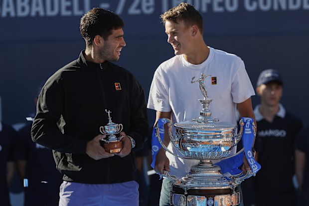 Spain's Carlos Alcaraz and Holger Rune after the ATP Barcelona Open.