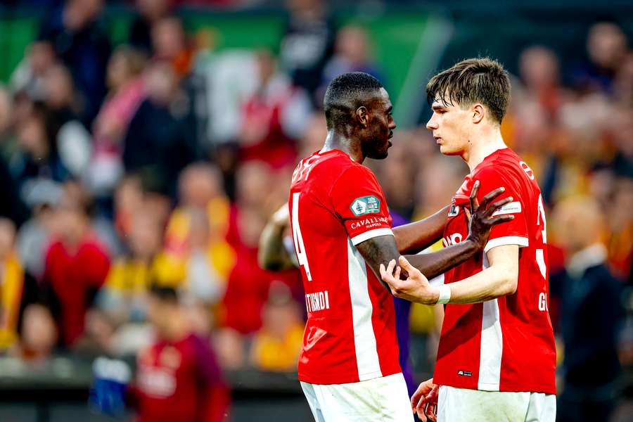 AZ's Bruno Martins Indi calms down his team-mate Wouter Goes during the KNVB Beker final against AZ