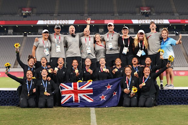 Gold medalists Team New Zealand celebrate their triumph during the Womens Rugby Sevens Medal Ceremony at the Tokyo Olympics.