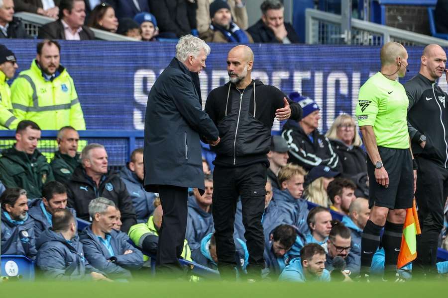 David Moyes and Pep Guardiola shake hands after the Everton vs Manchester City game