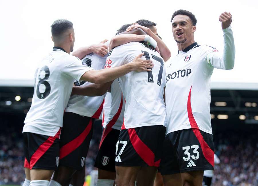 Alex Iwobi of Fulham celebrates scoring Fulham's first goal during the Premier League home game against Chelsea