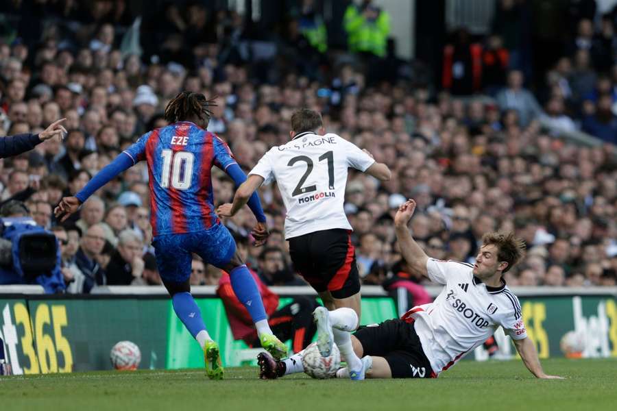 Fulham's Joachim Andersen tackles Crystal Palace ace, Eberechi Eze, during the Emirates FA Cup quarter-final match