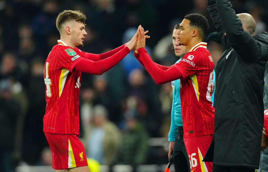 Liverpool's Conor Bradley is replaced by Trent Alexander-Arnold during the Carabao Cup, Semi Final, First Leg against Tottenham Hotspur on Jan 8, 2025.