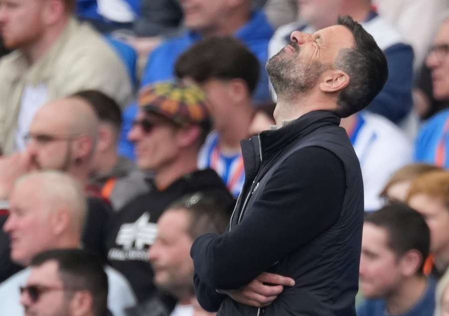 Leicester's Ruud van Nistelrooy reacts during the Premier League game against Brighton
