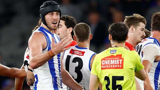 North Melbourne's Tristan Xerri speaks with an umpire during the 2025 AFL Round 04 match against the Sydney Swans at Marvel Stadium on April 5, 2025, in Melbourne, Australia. (Photo by Michael Willson/AFL Photos via Getty Images)