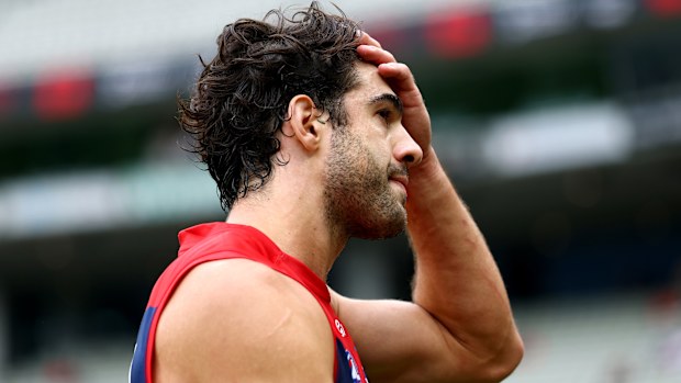 Christian Petracca of the Demons looks dejected after losing the round three AFL match