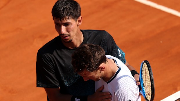 Alexei Popyrin (L) of Australia celebrates winning his match against Casper Ruud of Norway during day five of the Rolex Monte-Carlo Masters at Monte-Carlo Country Club on April 10, 2025 in Monte-Carlo, Monaco. (Photo by Clive Brunskill/Getty Images)