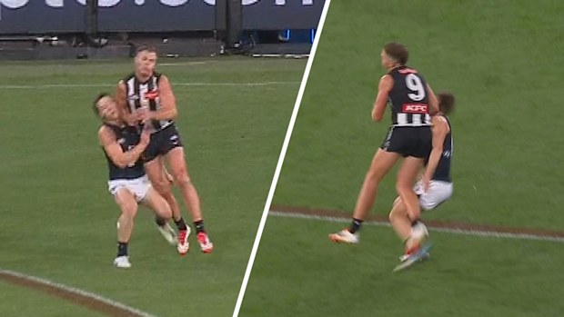 Collingwood's Dan Houston executed a severe hit on Carlton's Lachie Fogarty.