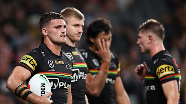 Nathan Cleary of the Panthers and teammates observe after a loss.
