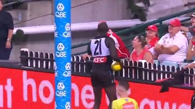A Swans fan threw a banner at Aliir Aliir.
