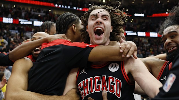 Josh Giddey of the Chicago Bulls celebrates with teammates.