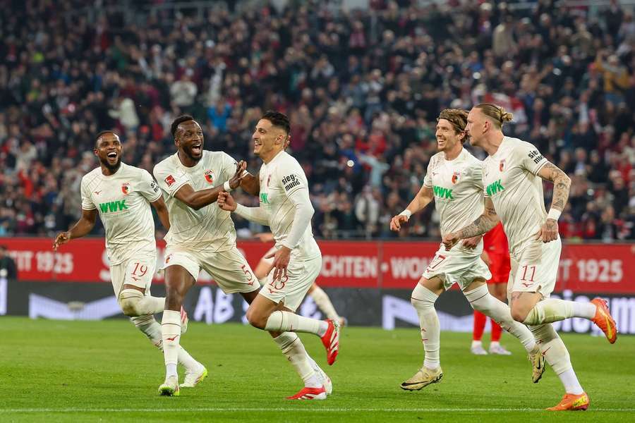 Augsburg celebrate their opener