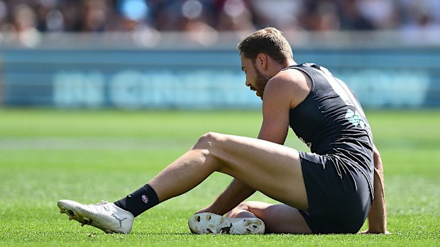 Harry McKay of the Blues looks dazed.