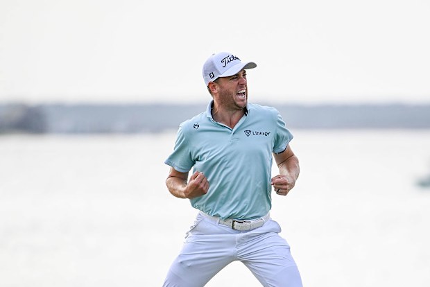 Justin Thomas celebrates after making a winning birdie putt on the 18th hole green during a playoff in the final round of the RBC Heritage.