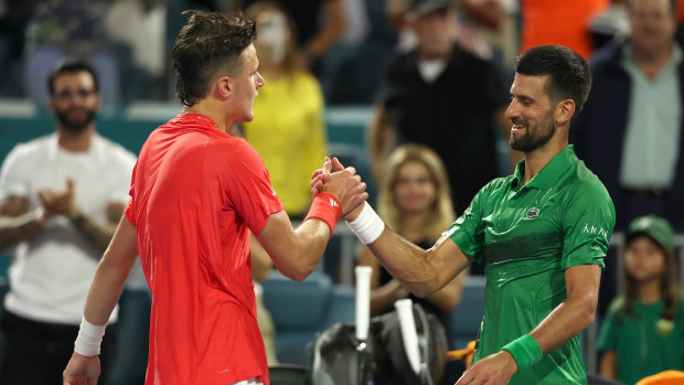 Jakub Mensik of the Czech Republic greets Novak Djokovic of Serbia after winning the men's singles final on the final day of the Miami Open Presented by Itau 2025 at Hard Rock Stadium on March 30, 2025 in Miami Gardens, Florida. (Photo by Al Bello/Getty Images)