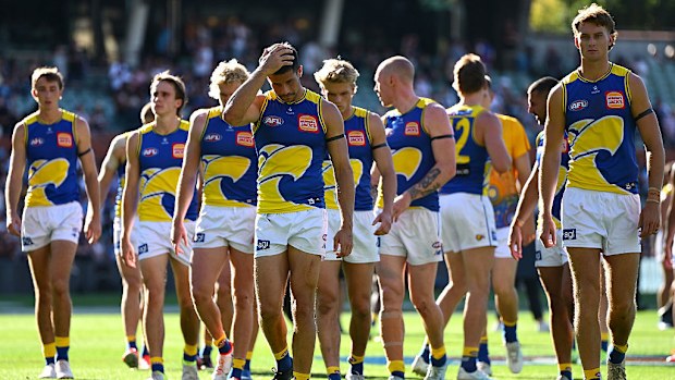 The Eagles look dejected after losing the round five AFL match against Carlton Blues.
