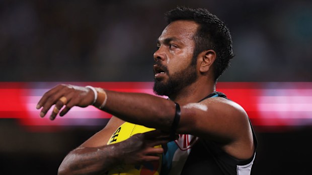 Willie Rioli of the Power prepares to kick.