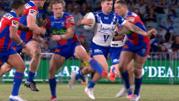 Phoenix Crossland trips Toby Sexton.