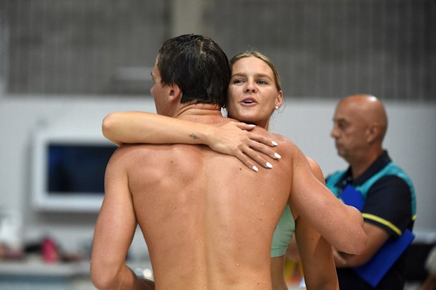 Shayna Jack and her younger brother Jamie embrace at the 2025 Australian swimming championships held in Brisbane.