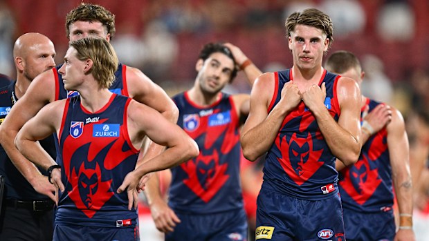 Caleb Windsor of the Demons watches on after the loss during the round five AFL match between Melbourne Demons and Essendon Bombers.