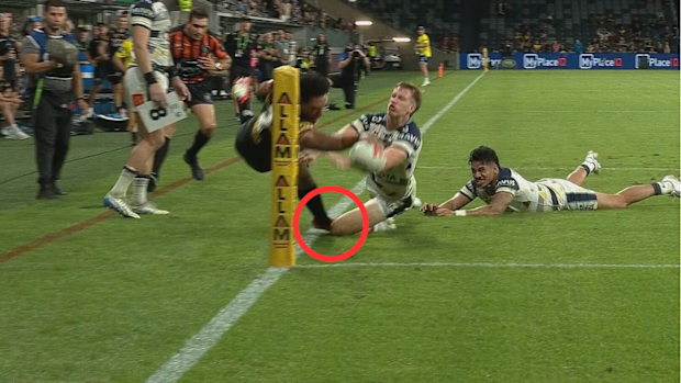 Paul Alamoti is denied a try against the Cowboys.