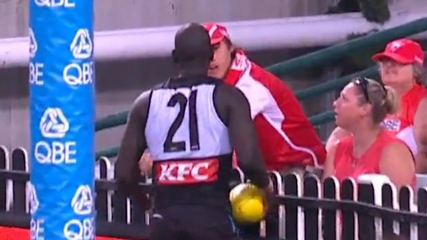 Aliir Aliir confronts a Swans fan after they threw an object towards him.