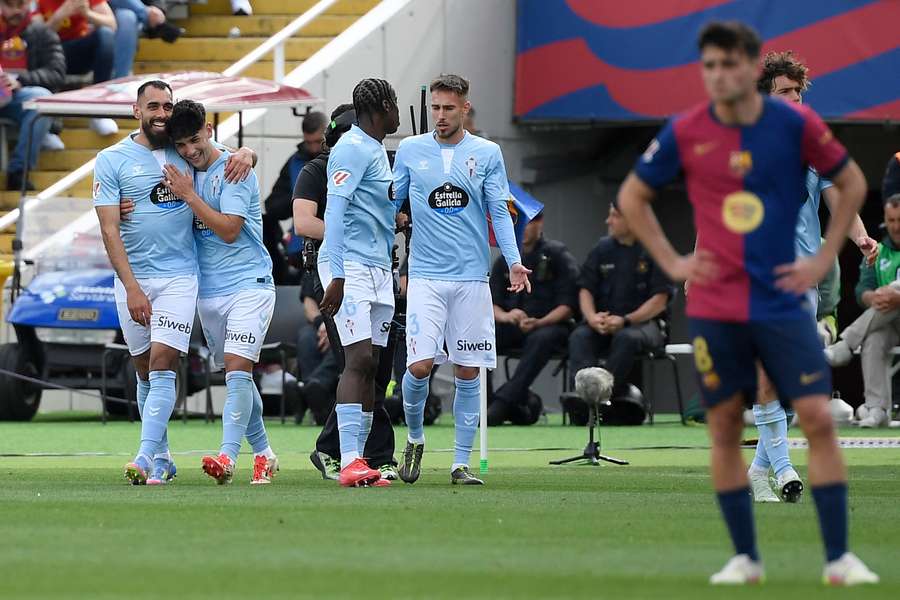 Borja Iglesias, left, netted a hat-trick for Celta despite the loss