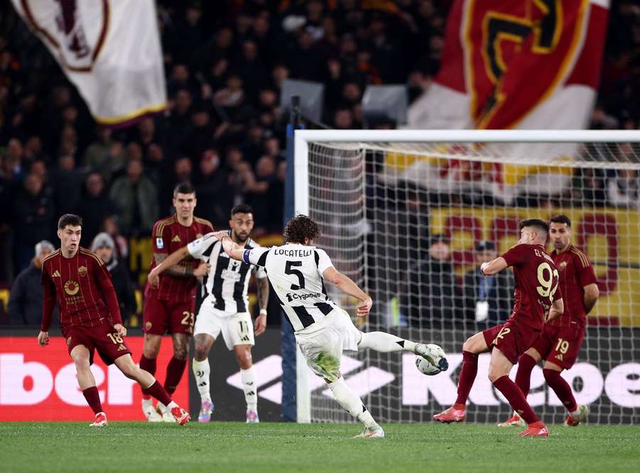 Juventus' Manuel Locatelli scores their first goal against Roma