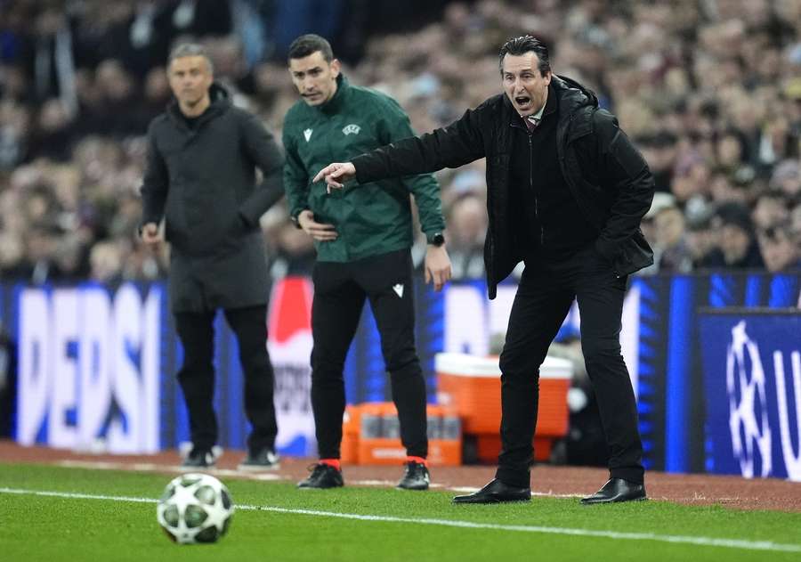 Aston Villa's Unai Emery (right) and PSG head coach Luis Enrique (left) during the Champions League quarter-final, second leg match at Villa Park on April 15, 2025.