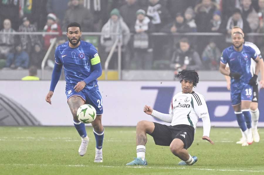 Reece James and Maxi Oyedele during the UEFA Conference League quarter-final match between Legia Warsaw and Chelsea
