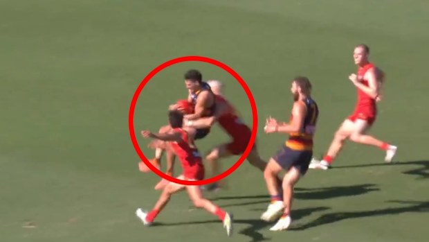 Izak Rankine is denied a last-ditch shot at goal.