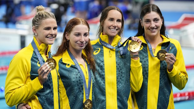 Australia's Shayna Jack, Mollie O'Callaghan, Emma Mckeon and Meg Harris, from left, celebrate after winning the women's 4x100-meter freestyle relay final at the 2024 Summer Olympics, Saturday, July 27, 2024, in Nanterre, France.