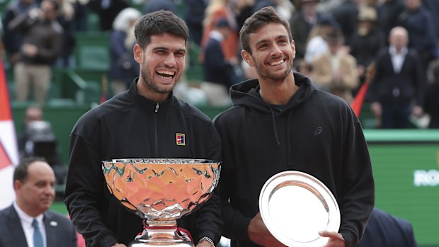Carlos Alcaraz of Spain and Lorenzo Musetti of Italy during the trophy ceremony following the Men's Final of the Monte-Carlo Masters.
