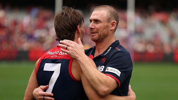 Melbourne Coach Simon Goodwin and Jack Viney of the Demons embrace.