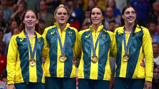 From left: Mollie O'Callaghan, Shayna Jack, Emma McKeon and Meg Harris pictured during the medal ceremony after winning 4x100m freestyle gold at the Paris Olympics.