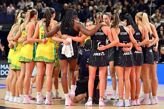 Australia and New Zealand huddle following game four in the Constellation Cup series.