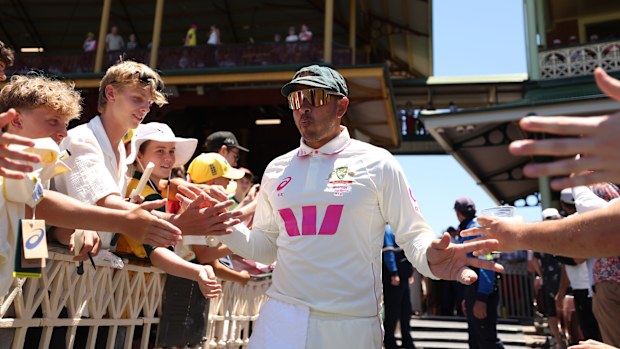 Usman Khawaja of Australia heads out onto the SCG for his final day of Test cricket.