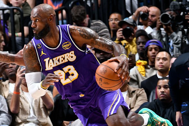 LeBron James dribbles the ball against the Orlando Magic.